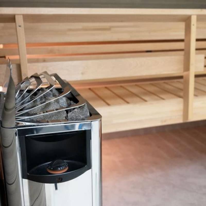 Электрическая каменка Harvia The Wall SW80 8,0 kW стальная в интерьере парной